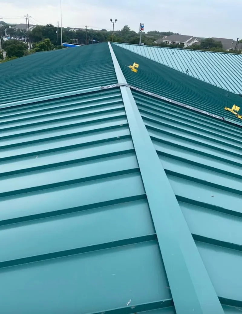Green commercial metal roof ridge and valley for Metal Roof Repair in Wollochet