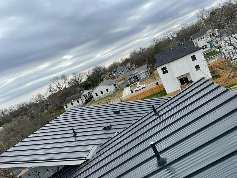 Standing seam metal roof panels with vents for Skylight Repair in Wollochet